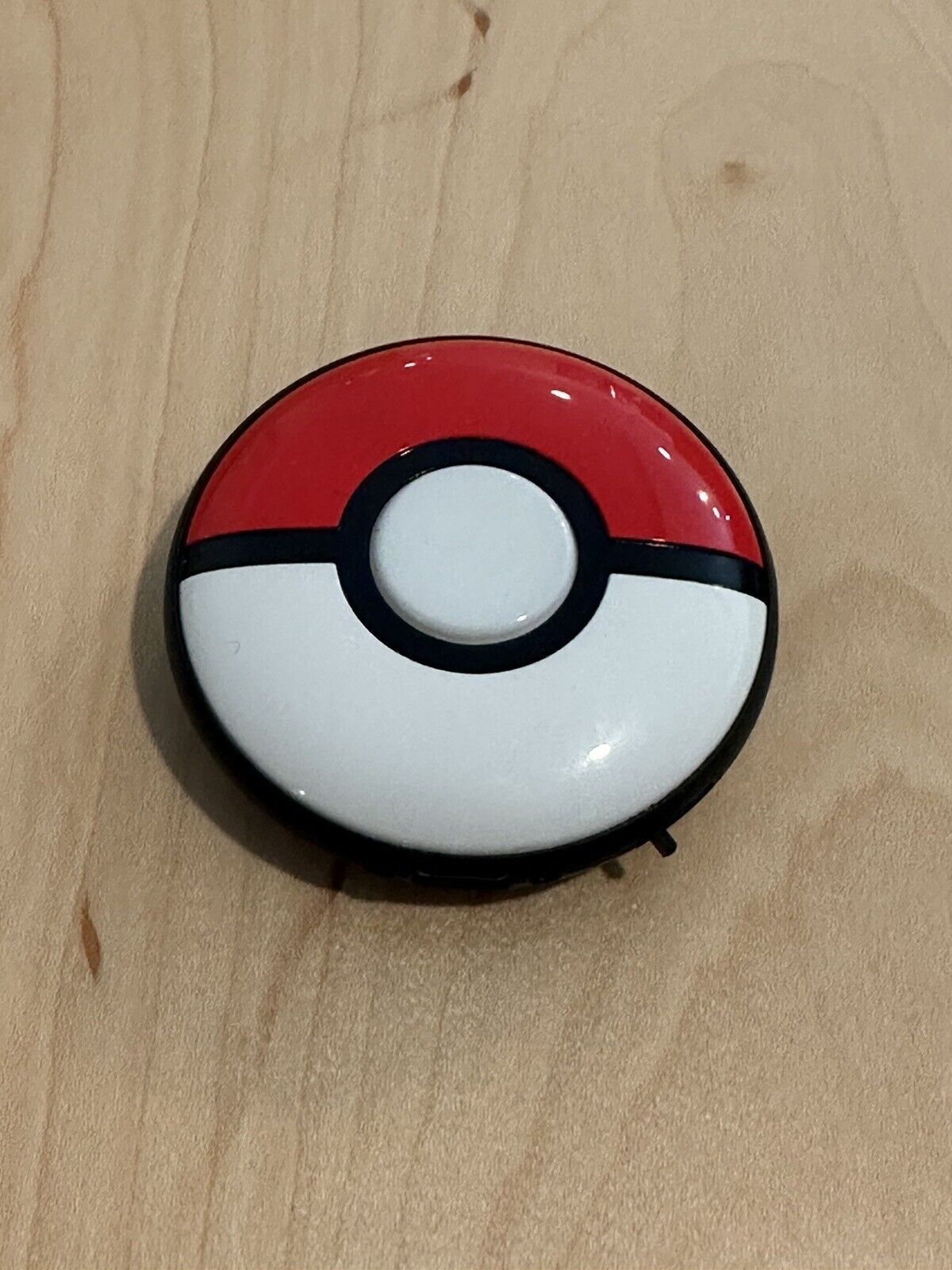 Image of a modified Pokemon Go Plus Plus accessory, an auto catcher that uses Ultra Balls in the mobile app Pokemon GO.